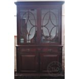 A late Victorian carved mahogany library bookcase,