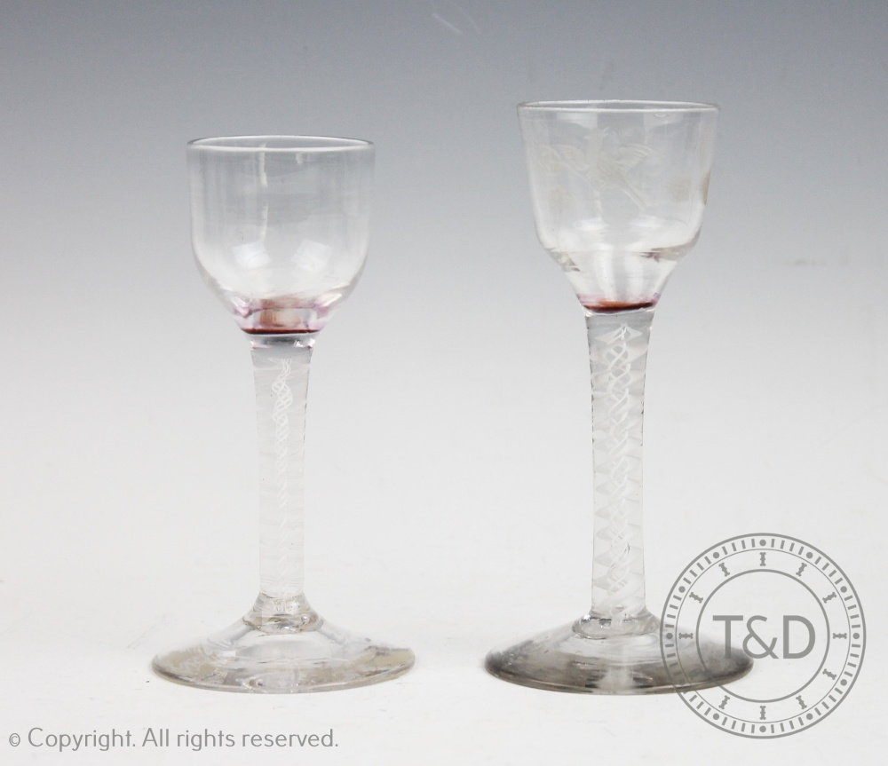 Two George III double opaque air twist wine glasses,