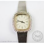 A ladies diamond wristwatch 'Le Monde', the cushion shaped silvered dial with diamond set bezel,