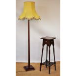 A stained beech standard lamp, 151cm H,