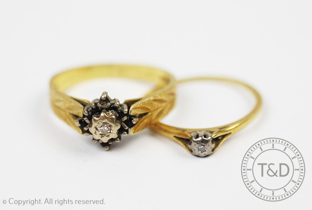 Two diamond set 18ct yellow gold rings,