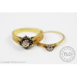 Two diamond set 18ct yellow gold rings,