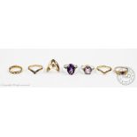 A collection of rings, to include; three 9ct gold wishbone rings, weight 5.