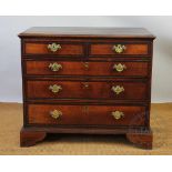 A George III and later oak and mahogany cross banded chest,