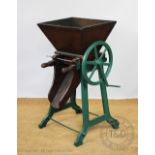 A cast iron vintage 'spring cheese press' / 'peg mill', by Bamber & Co of Preston,