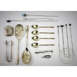 A small selection of silver and objects of virtue to include an Edwardian hat pin with silver teddy