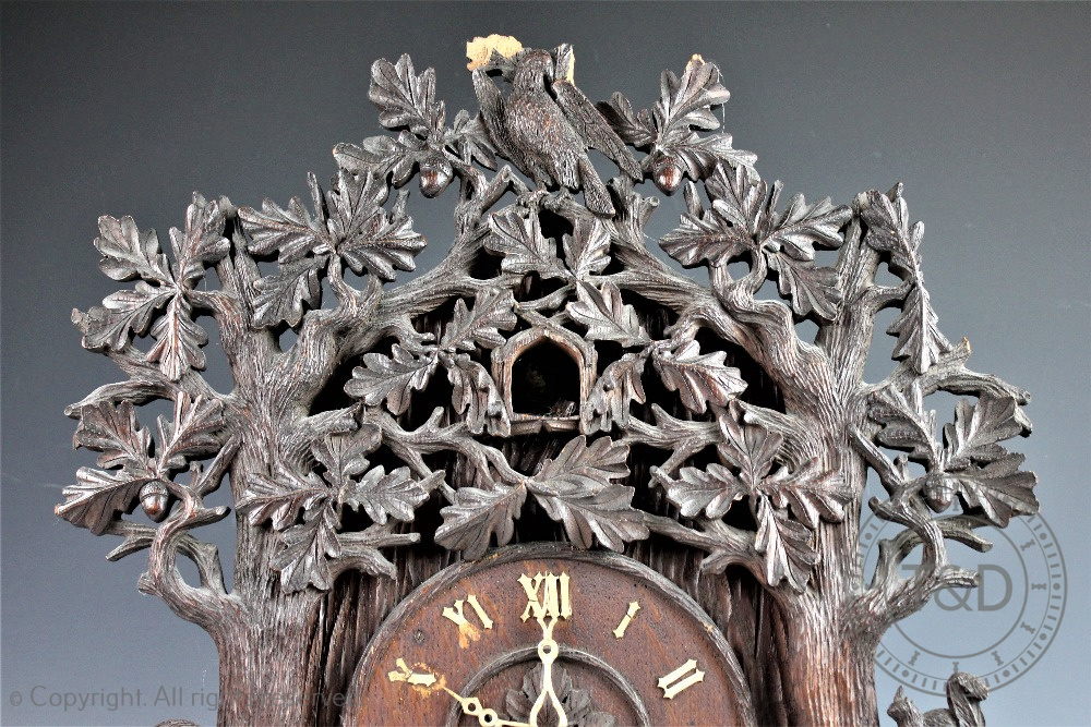 A later 19th century Black Forest carved wood twin fusee cuckoo clock, - Bild 4 aus 18