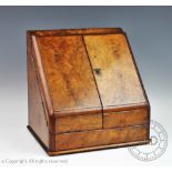 A Victorian walnut stationery box, with base drawer,
