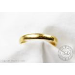 A 22ct yellow gold wedding band, gross weight 5.