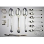A cased set of six silver tea spoons, Sheffield 1923, with three silver table spoons,