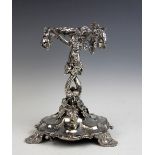 A 19th century silver plated centrepiece, modelled as three vines with flowers and leaves,