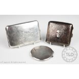 A George V silver memento mori cigarette case, William Hair Haseler, Birmingham 1920,