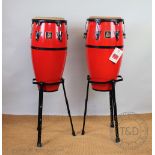 A pair of Aspire Conga drums on stands,