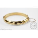 A 9ct yellow gold hinged bangle, Smith and Pepper Birmingham 1963,