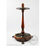 A Victorian style walnut stick stand,