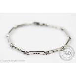 A diamond set 9ct white gold bracelet,