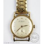 A 9ct yellow gold wristwatch, the champagne dial signed 'J Buhre', with Roman numerals,