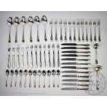 A Roberts and Belk one hundred and forty piece suite of plated flatware, with beaded oval handles,