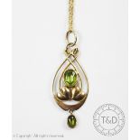 A Murrle Bennett and Co peridot set pendant,