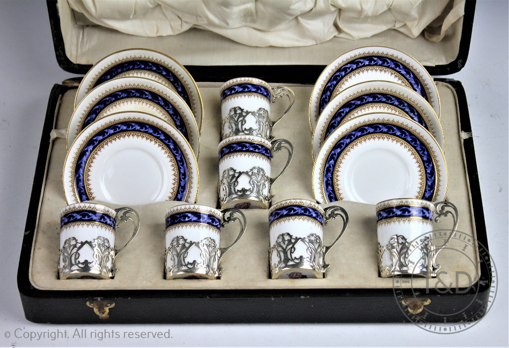 A Royal Worcester silver mounted twelve piece coffee service, the silver cup holders London 1917, - Bild 2 aus 3