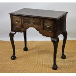 A George III style oak low boy,