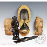 A seated seated South African Chokwe Angola tribal art figure, 25cm,