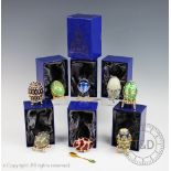 A collection of seven Atlas Edition decorative eggs,