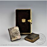 A miniature hymn book and prayer book, both decorated with Reynolds angels,
