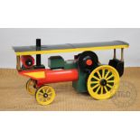 A modern wooden model of a traction engine,