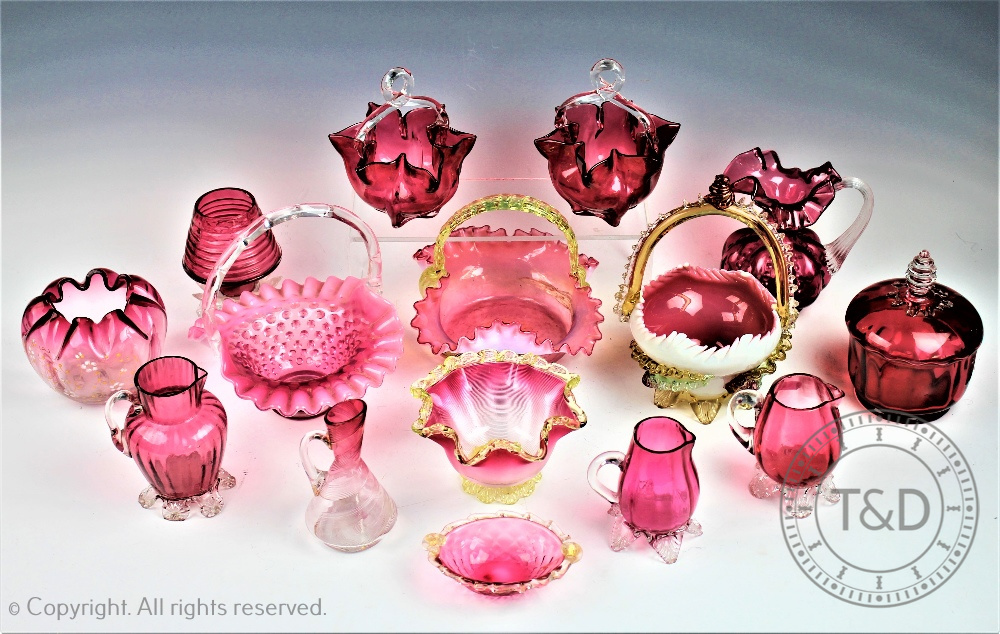 Fourteen pieces of Victorian and later cranberry glass,