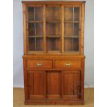 A pine kitchen dresser, with three glazed doors,