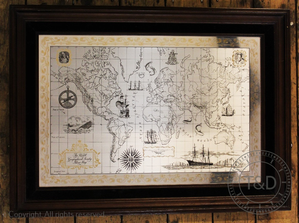 A Royal Geographical Society silver map, framed and glazed,