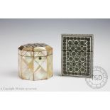 A 19th century octagonal mother of pearl and white metal inlaid box and cover,