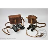 A pair of Negretti & Zambra of London 'The Minim' binoculars,