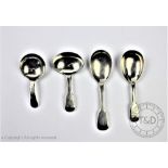 Four silver caddy spoons; Elizabeth Morley, London 1800, Elizabeth Eaton, London 1849, John,