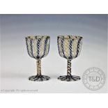 A pair of Italian latticino glass goblets,