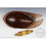 An Oceanic tribal art Papau New Guinea Massim carved wooden fish shaped dish with shell eye, 50cm,