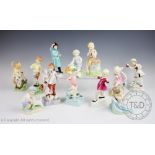 A set of twelve Freda Doughty for Royal Worcester months of the year figures,