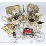 A collection of silver and silver plated items to include; a pair of silver sugar nips,