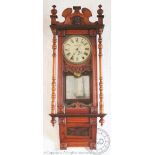 An Edwardian regulator type walnut wall clock, the painted dial signed 'W.