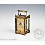 A Lund & Blockley of Bombay lacquered brass carriage timepiece,