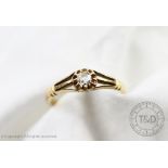 A Victorian diamond set ring, designed as an old cut diamond, claw set in yellow metal,