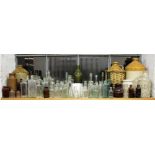 A quantity of assorted vintage ale and pharmaceutical bottles to include local examples,