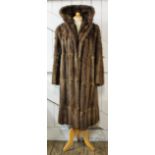 A vintage style three quarter length fur coat, probably musquash,