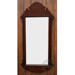 A modern George III style oak wall mirror,