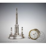 A Victorian silver plated table lighter of tower form, on an oval base,