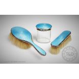 A three piece Art Deco silver and turquoise enamel dressing table set, Lionel Smith & Co,