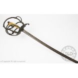 A German duelling sword or schlager, the curved blade and wrought basket hilt with wooden grip,
