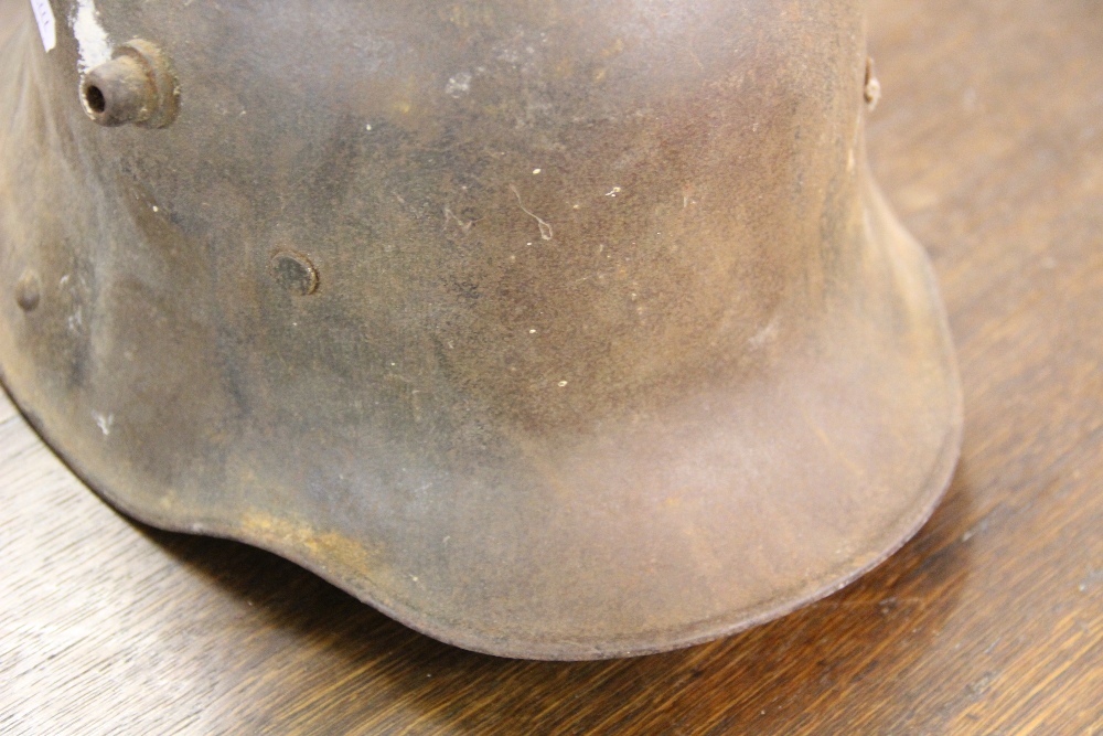 A German helmet - possibly World War I, with a No 2 1980 pattern army uniform, - Image 5 of 5