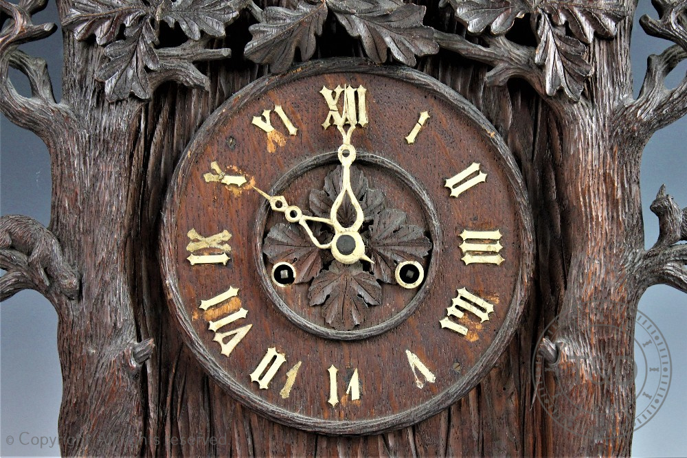 A later 19th century Black Forest carved wood twin fusee cuckoo clock, - Bild 3 aus 18